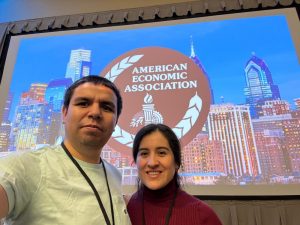 Graduate Student Luis and Jhinia selfie at American Economic Association Conference